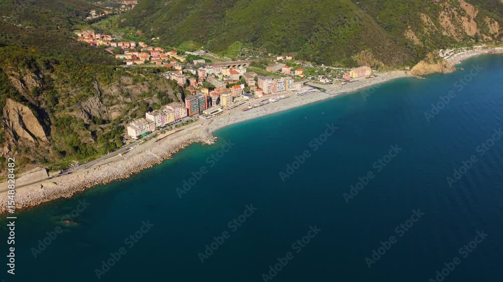 Beautiful coastal town in Italy with clear water and colorful buildings along the beach Beautiful coastal town in Italy with clear water and colorful buildings along the beach