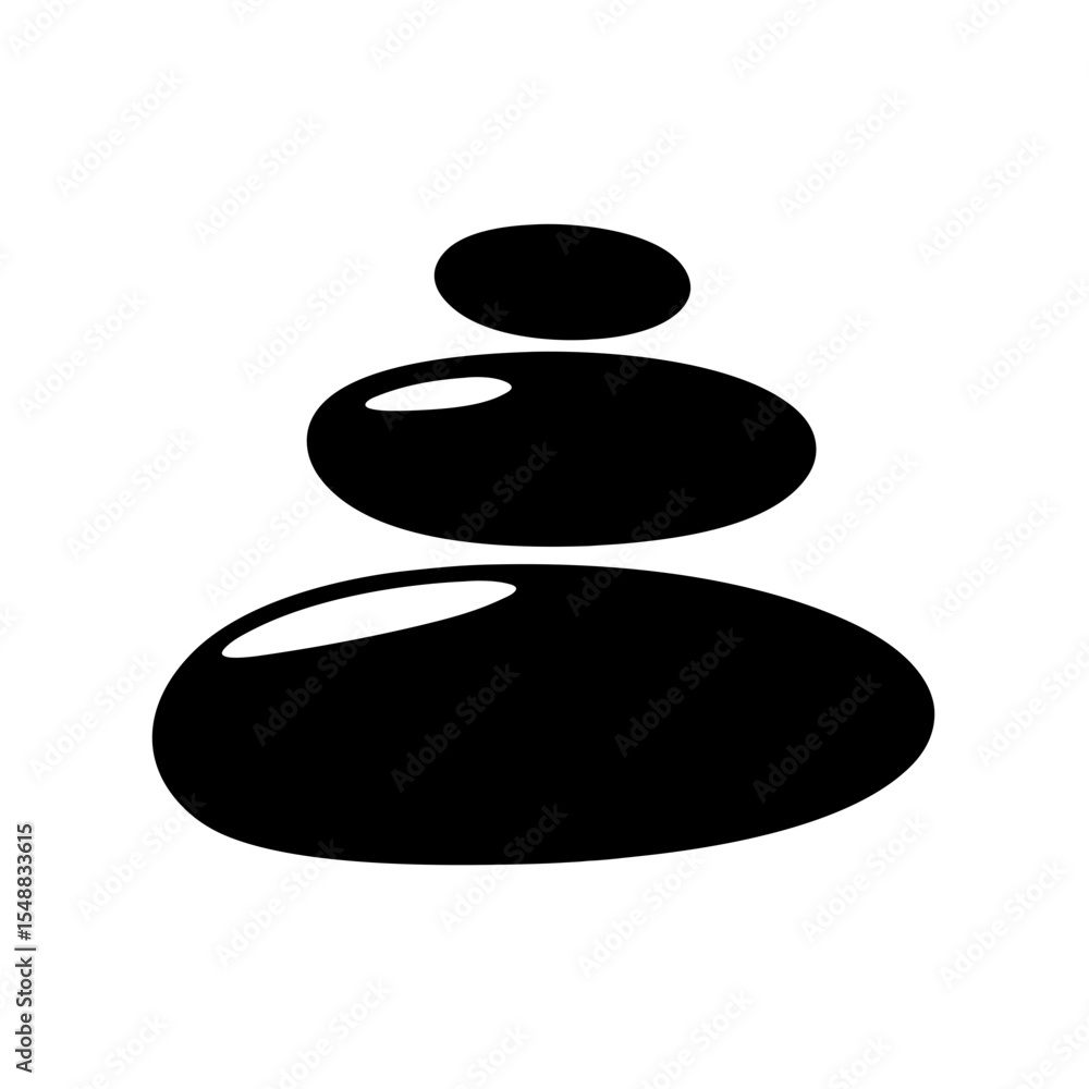 Black stones stacked carefully on top of each other in a zen style Black stones stacked carefully on top of each other in a zen style
