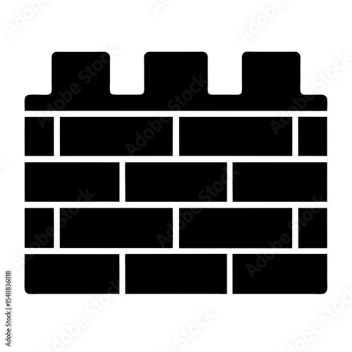 Solid and secure old brick wall with fortified castle features