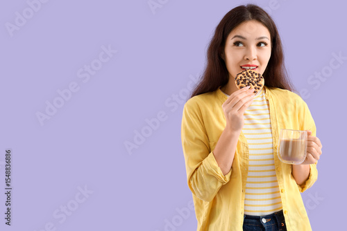 Young Asian woman with cup ...