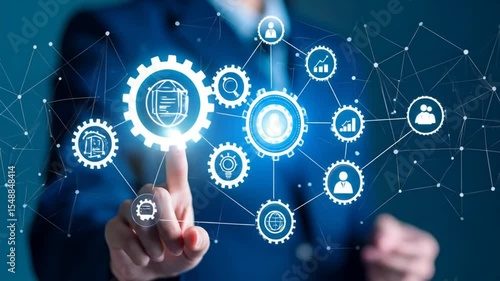 A hand interacting with a network of interconnected gears and icons, suggesting a complex system of business processes, possibly digital