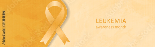 Orange ribbon for leukemia awareness month on textured grunge background, symbolizing hope and support. Vector banner design