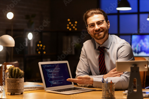 Handsome businessman workin...