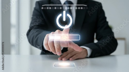 Businessman Activating Futuristic Power Button in Digital Interface