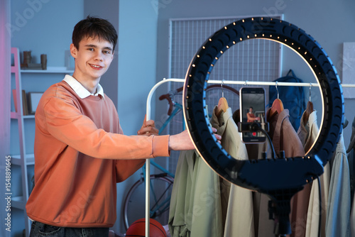 Teenage blogger with clothe...