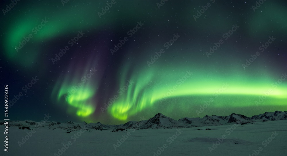 Majestic Aurora Borealis Display over Snowy Mountain Range at Night Majestic Aurora Borealis Display over Snowy Mountain Range at Night