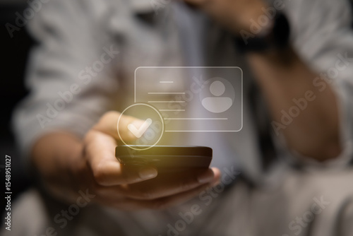 Slika na platnu human hand holding digital identification card, with Checkmark Icons for Identity verification, ID card with checkmark
