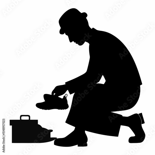 Silhouette vector of a cobbler polishing shoes