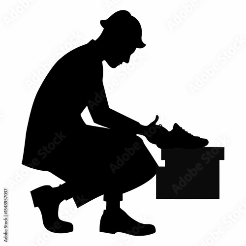 Silhouette vector of a cobbler polishing shoes