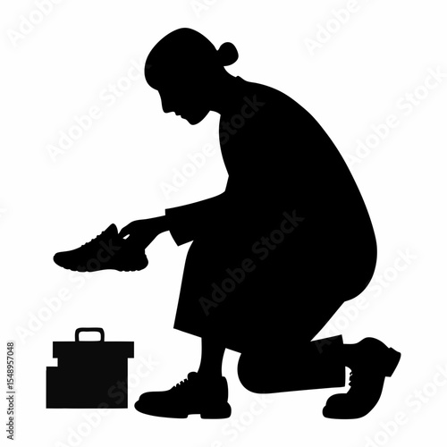 Silhouette vector of a cobbler polishing shoes