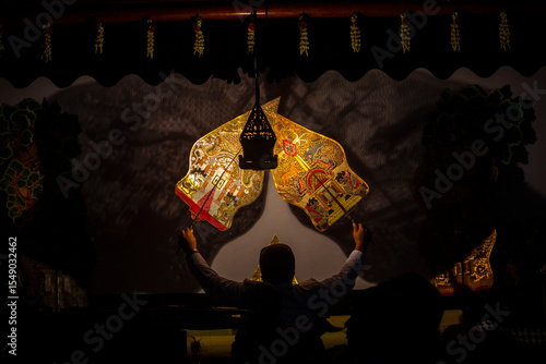 wayang kulit or shadow puppets from Java, Indonesia puppet show by dalang or puppeteer . Wayang made from leather