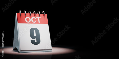 October 9 Calendar Spotlighted on Black Background