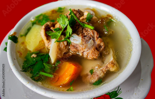 Foto sop buntut or oxtail soup or tail soup is traditional soup made from tail ox, Bo