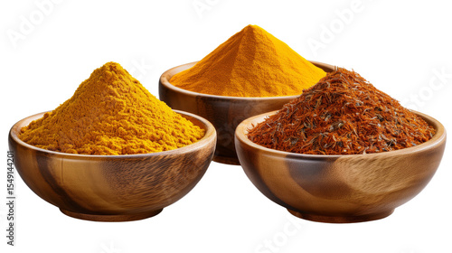 Fototapeta Naklejka Na Ścianę i Meble -  Vibrant Turmeric, Saffron, and Curry Powder in Wooden Bowls