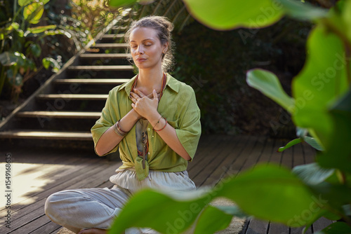 Konstfotografi Young beautiful woman meditating in retreat