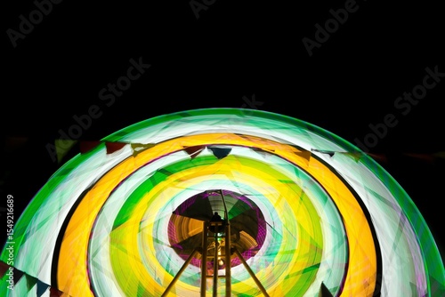 Canvastavla Ferris wheel at night festival in slow motion photo. High Roller