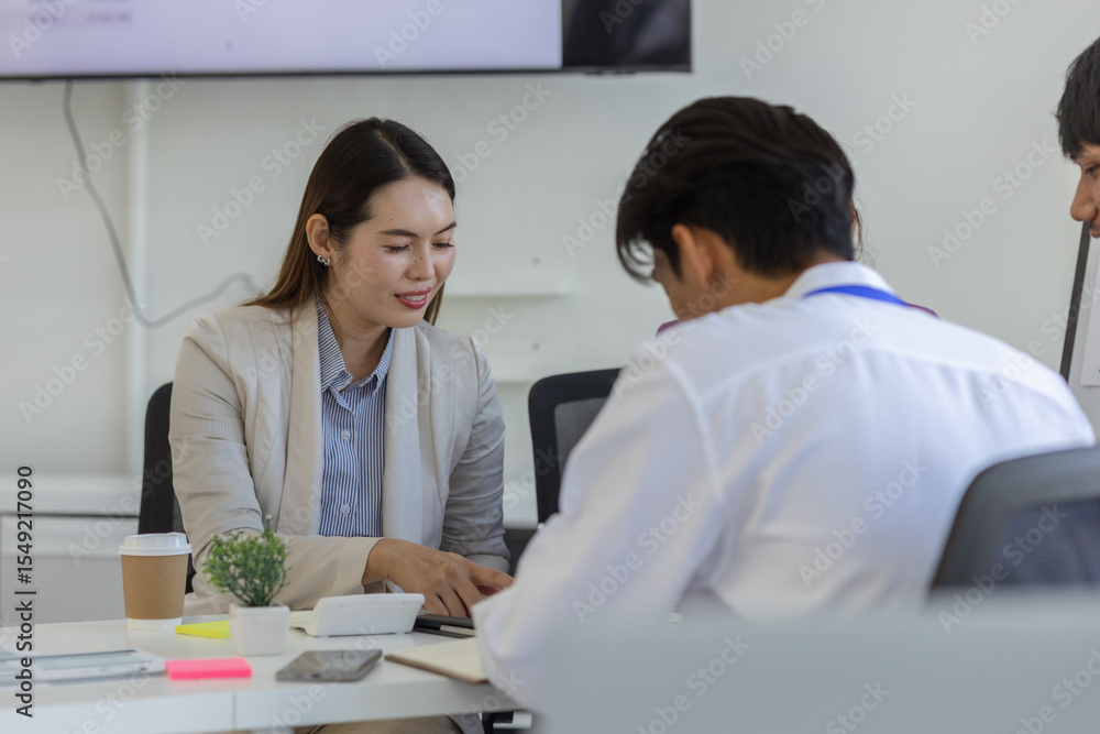 Fototapeta premium entrepreneurs brainstorm together to develop new products in a conference room, businesspeople share knowledge on marketing strategies and finance4s with each other, accountant, businessman