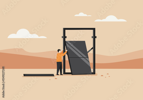 A man installs a large framed picture outdoors. A simple, modern setup against a desert landscape. Clean lines and a minimalist aesthetic.