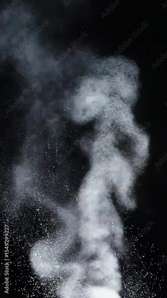 Black background with floating white dust particles, creating a ...