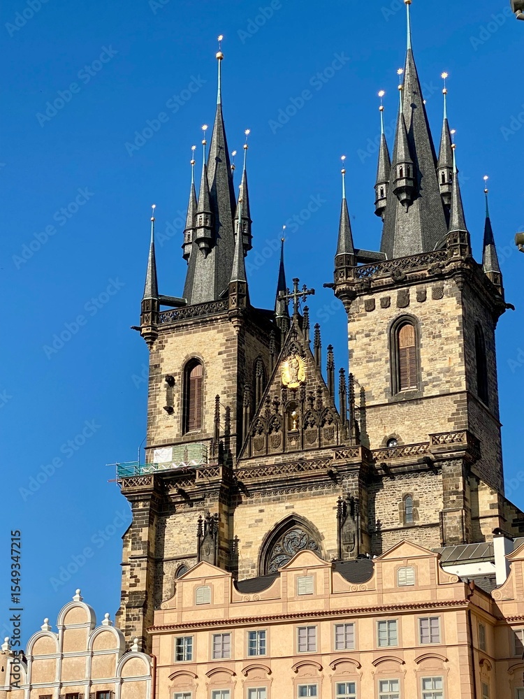 Fototapeta premium Beautiful Gothic Architecture of a Historic Clock Tower in Prague