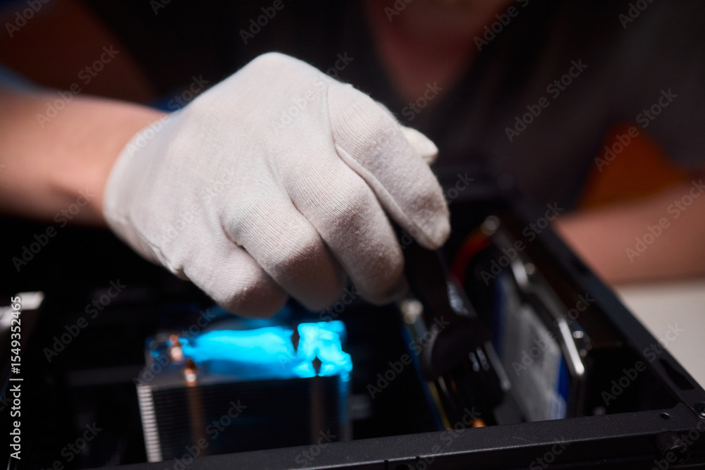 Cleaning a processor fan with a brush Cleaning a processor fan with a brush