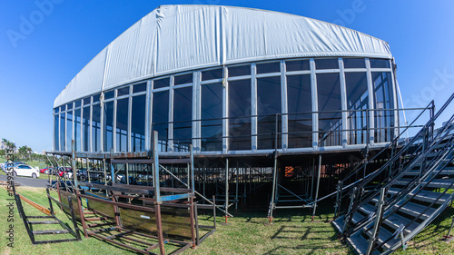 Large portable canvas tent structures with clear plastic perspex walls.