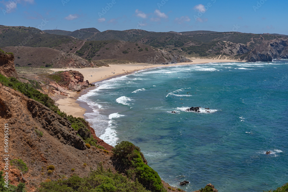 Obraz premium Landscape of the Amado beach since lookout in a sunny day, Carrapateira, Portugal.