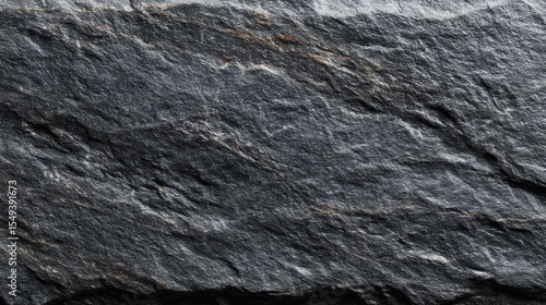Macro close-up of weathered slate rock surface with fine mica flecks and mineral striations