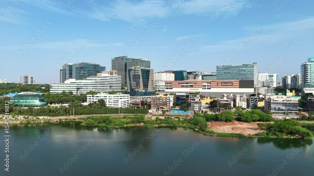 Hyderabad, India: Aerial view of modern office buildings skyline in capital and largest city of Indian state of Telangana - landscape panorama of South Asia from above
Hyderabad, India: Aerial view of modern office buildings skyline in capital and largest city of Indian state of Telangana - landscape panorama of South Asia from above