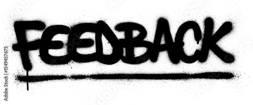 Graffiti feedback text sprayed in black over white