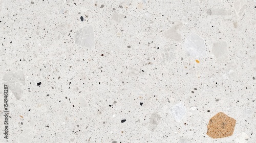 Light Gray Terrazzo Texture with Specks of Black, White, and Beige Stones for Modern Interior Design Applications and Backgrounds