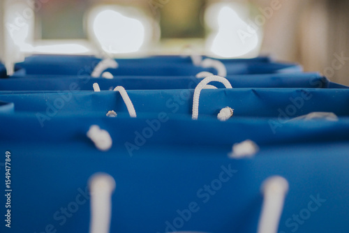 Vászonkép blue goodie bags lined up, selective focus