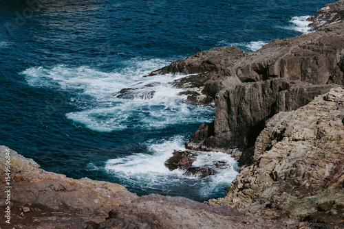 waves crashing on rocks
