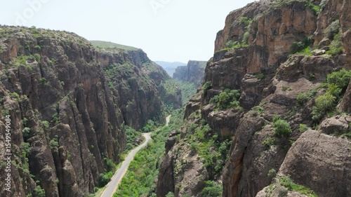 Aerial view a  winding track among the rocks in Armenia. A picturesque highway. Winding mountain road among the mountains In Syunik province, Armenia. Rocks near Noravanq monastery.