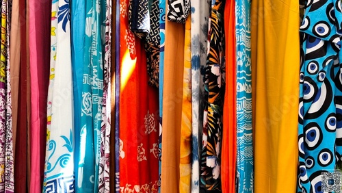 Bild auf Leinwand Background view of multicolored patterned cloth and silk textiles with intricate
