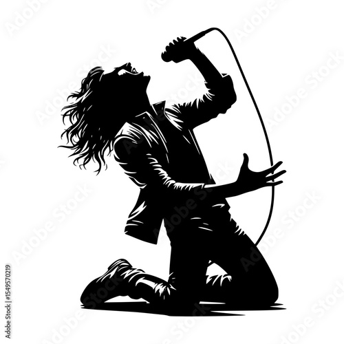 Passionate rock singer silhouette kneeling with microphone