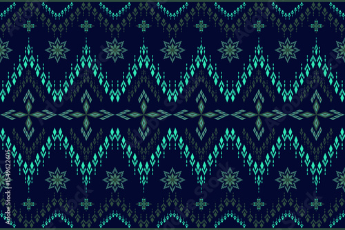 A dark blue native woven fabric pattern blending geometric and floral motifs in teal and dark green tones, creating a calm and mysterious feel.