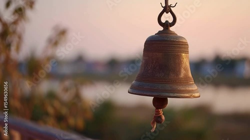 Wallpaper Mural Antique Bell Hanging in Tranquil Sunset Background Over Water Torontodigital.ca