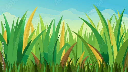 Vibrant green grass blades sway gently against a soft blue sky with clouds