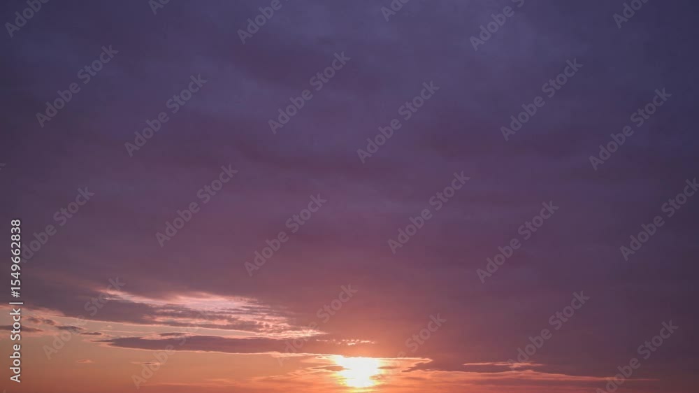 Serene Sunset: Orange and Purple Hues Paint the Evening Sky Serene Sunset: Orange and Purple Hues Paint the Evening Sky