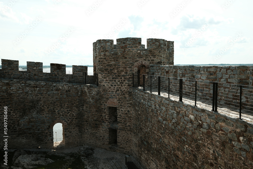 Corner tower and fortress wall of Ram Fortress overlooking the Danube River. A popular tourist destination in Serbia country Corner tower and fortress wall of Ram Fortress overlooking the Danube River. A popular tourist destination in Serbia country