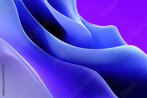 Close-up of smooth flowing abstract blue and purple fabric or wave-like shapes with soft curves and gradient colors for artistic digital background