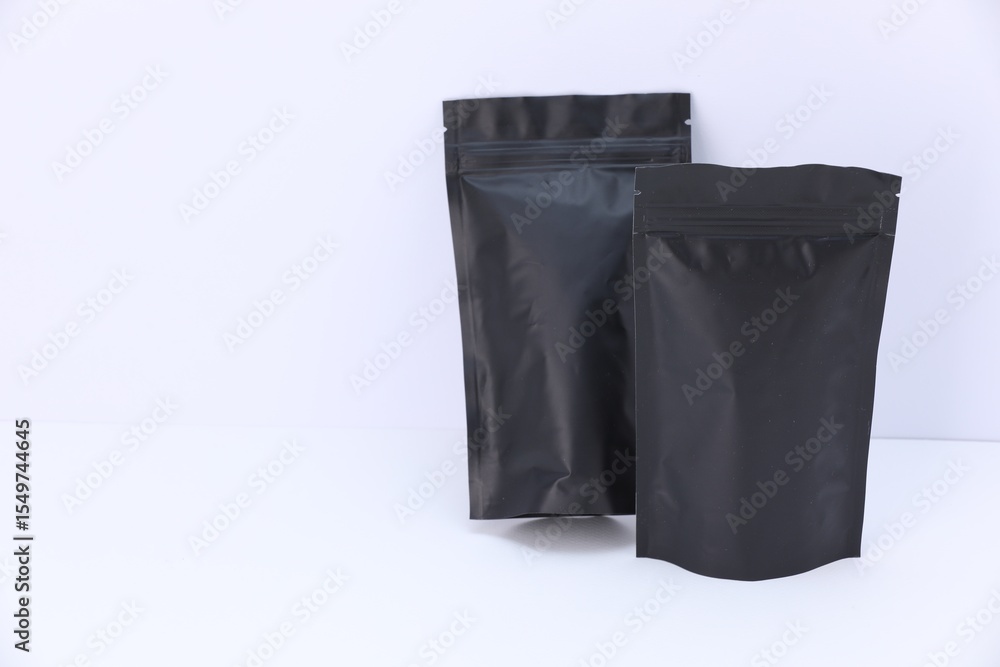 Zipper stand-up pouches on white background. Mockup for design Zipper stand-up pouches on white background. Mockup for design