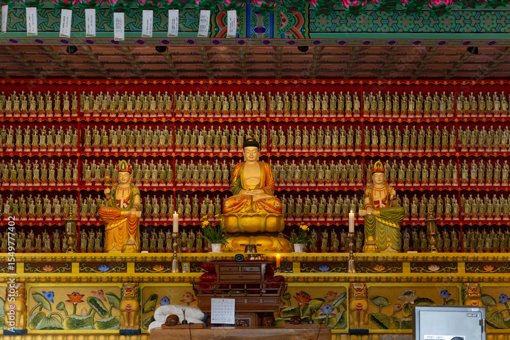 Fototapeta premium Korean traditional temple with Buddhist wooden buildings, traditional patterns of dancheong and roof tiles