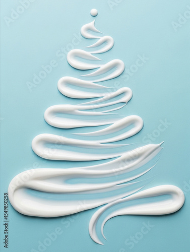 Concept of a Christmas tree in the form of cosmetic touches on a blue background. Winter concept. Skin care