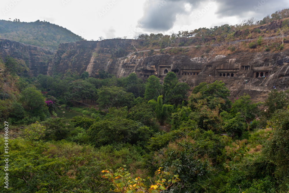 Fototapeta premium Panoramic View of Green Valley and Ancient Caves