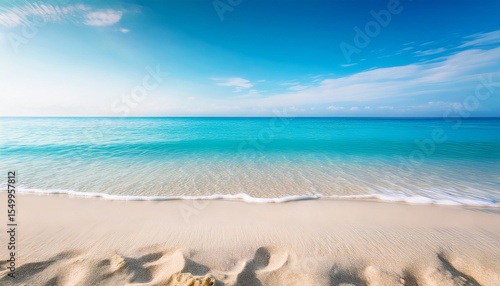 minimalistic beach background featuring white sand in sharp focus with a blurred turquoise ocean and sky in the distance the soft bokeh effect creates a dreamy calm atmosphere ideal for summer theme