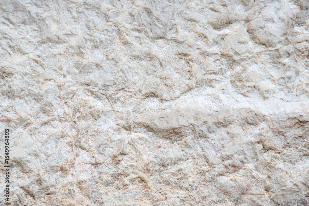Close-Up of Natural Stone Texture with Soft Beige and White Tones Close-Up of Natural Stone Texture with Soft Beige and White Tones