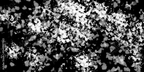 Snowflakes on dark background. white icy snowflakes isolated on black background, natural background. white crystalline powder on a black background. sugar dust. texture, pattern and clipping.
