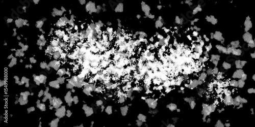 Snowflakes on dark background. white icy snowflakes isolated on black background, natural background. white crystalline powder on a black background. sugar dust. texture, pattern and clipping.